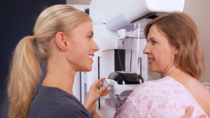 woman with staff getting 3D Mammography